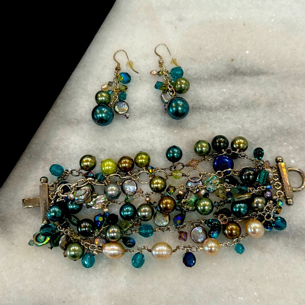 Swarvoski, pearl, silver bracelet and earrings.